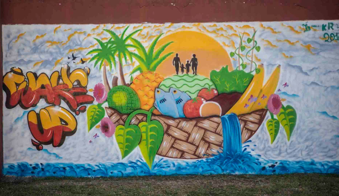 Healthy island waking up with the sun - Mural painted by youth from Vanuatu